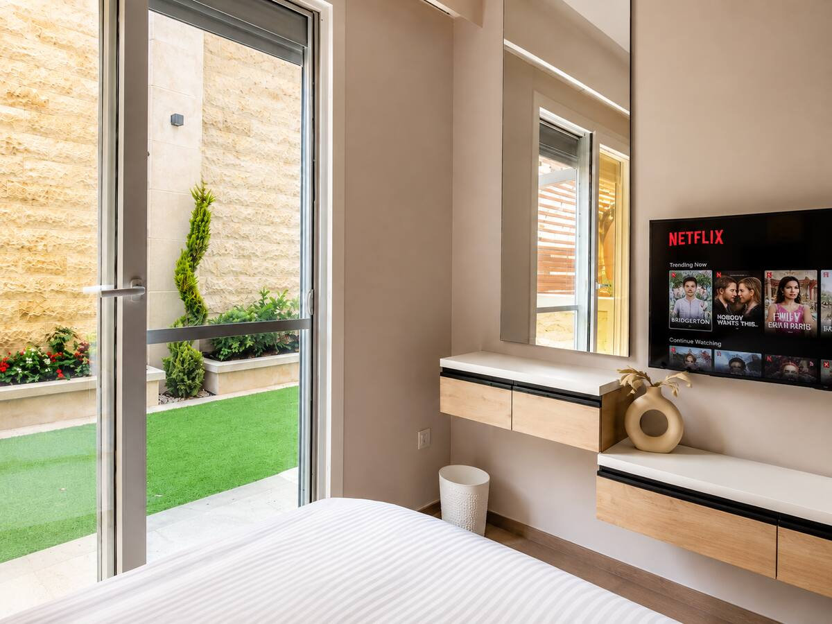 Primary bedroom overlooking the private garden
